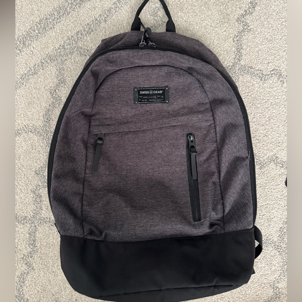 Swiss Gear Backpack Black and Gray
Small tear by zipper